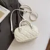Nova bolsa de mão com padrão de diamante transfronteiriça, bolsa de ombro casual de nicho para o dia a dia, bolsa de ombro feminina de alta qualidade, versão coreana, versátil