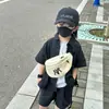 Nueva Bolsa Estilo Coreano para Niños Bolso Cruzado Niño Niño Guapo Saliente Moda Bolso para Teléfono Móvil Bolsa de Cintura para Bebé Bolso de Pecho