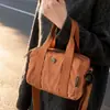Bolsa de Lona Leve Estilo Casual para Mulheres 2025 Novo Estilo Coreano Nicho Bolsa de Mão para o Dia a Dia Bolsa de Ombro Único Transversal