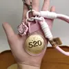Llavero Dorado Oro Puro Serie de Oro 999 "Lista Dorada" Princesa Por Favor Hazte Rica Serie 520 Bolsa Rosa Colgante para Teléfono