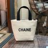 Bolso de lona temperamental 2024 nuevo estilo bolso pequeño para salidas bolso de mamá bolso de mano para mujer ins moderno bolso pequeño