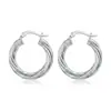 Aretes de aro trenzados multicapa para mujer, simples y versátiles, adecuados para el uso diario, con un estilo fresco y elegante, hechos de acero de titanio en color plateado