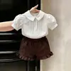 Conjunto de Verano para Niña 2026 Nuevo Estilo Coreano Camisa Blanca Plisada de Manga Corta para Bebé con Encaje Pantalones Cortos Casuales