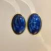 Aretes ovalados de acrílico con degradado estilo Melard para mujer, aretes de lujo ligero de alta gama, aretes de diseño de nicho para mujer