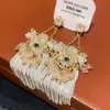 Pendientes Redondos Plegados con Borlas Tachonados de Pedrería Estilo Retro Europeo y Americano, de Moda y Versátiles, con un Toque de Lujo Ligero y de Alta Gama