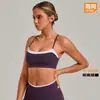 Sujetador deportivo cruzado de dos piezas falso transfronterizo para mujer, sensación de segunda piel, diseño de espalda cruzada, top deportivo ajustado para correr y yoga 2209