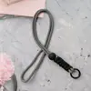Lanyard para Teléfono Móvil al por Mayor de Fábrica Creativo Corto Trenzado para Colgar en el Cuello Funda de Teléfono Móvil Lanyard Llavero Desmontable Correa Antiperdida