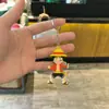Llavero Animación de Dibujos Animados Clásicos One Piece Muñeco de Luffy Cadena para Llaves de Coche Bolsa Colgante Pequeño Regalo Venta al por Mayor