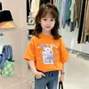 Camiseta de Algodão Puro de Manga Curta para Meninas Verão 2026 Novo Estilo Estampa de Desenho Animado Moda Infantil Versátil Camiseta de Meia Manga