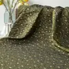 Tela de chaleco de hilo teñido con patrón de flor pequeña abstracta en relieve estéreo retro Tela decorativa jacquard para pantalones de vestir y chaquetas elegantes
