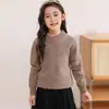 Suéter unisex de lana de color liso versátil para otoño e invierno para niños, camiseta base de cuello medio alto, suéter tipo jersey holgado en negro