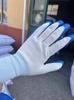 Guantes de protección laboral Ding Qing con revestimiento de nitrilo, guantes antideslizantes con revestimiento de nitrilo, guantes de protección laboral en relieve resistentes al desgaste.
