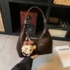Bolso de Axila de Alta Apariencia para Mujer 2026 Verano Nuevo Bolso Dumpling Moda Simple Bolso Tote Hombro Cruzado