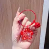 Pequeño regalo Día Nacional etiqueta de personaje acrílica de doble cara llavero recompensa preescolar pequeño regalo amuleto para mochila venta al por mayor