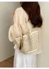 Bolso tote hueco de moda para vacaciones 2026, bolso de playa estilo cesta, bolso de hombro tejido a mano a la moda para vacaciones