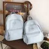 Mochila Casual Simple de Color Sólido Gran Capacidad Ligera Versátil Mochila de Viaje Hombres y Mujeres Exterior Estudiante Mochila Escolar Mujeres
