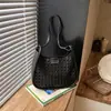 Moderna Bolso Cubo Grande Nuevo para Mujer 2026 Estilo Coreano Hueco Bolso de Hombro Único Versátil Bolso Cruzado para el Viaje Diario