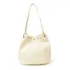 Bolso grande transfronterizo para mujer, bolso cubo vintage de cuero suave versátil de alta gama para el trabajo, nuevo bolso de hombro para mujer 2026