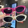 Óculos de sol de armação pequena olho de gato transfronteiriços óculos de sol para fotos show de óculos de sol compras legal anti-ultravioleta moda europeia e americana infantil novo