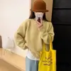 Suéter de Tricô Redondo Macio e Aconchegante Outono 2026 Nova Moda Emagrecedor Nicho Suéter Laranja