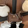 Bolso de mano de moda para mujer 2026 nuevo bolso de hombro con cadena francesa y patrón de diamantes, bolso de axila, bolso tote y bandolera de alta gama, moderno