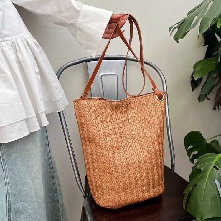 编织包女包新款潮2024夏草编简约百搭小清新水桶包个性单肩斜