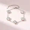 Pulsera popular de trébol de cuatro hojas de 13 mm exquisitamente elaborada, pulsera de cinco flores de nácar de doble cara de 18 quilates para mujer, nueva versión con un toque de alta gama
