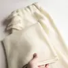 Calça larga versátil 100% lã para mulheres, solta e grossa, adequada para outono e inverno, corte reto, comprimento até o chão, com efeito de caimento, calça casual branca de caxemira