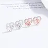 Preciosos pendientes de botón para mujer plata de ley 925 nuevo diseño de nicho con forma de corazón arete de cartílago de moda personalidad temperamento joyería de oído ins