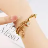 Europa y Estados Unidos estilo transfronterizo moda ins pulsera de acero de titanio todo partido estilo frío pulsera ovalada con forma de O de acero inoxidable 18K