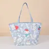 Bolsa de lona de gran capacidad personalizada con diseño de dibujos animados y aspecto de mezclilla, adecuada para ir al trabajo, ir de compras y como regalo cultural y creativo de moda