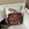 Bolso Tote de Gran Capacidad, Sencillo y Elegante para Mujer, Nuevo Verano 2026, Transparente de Gelatina con Graffiti, Bolso de Hombro Personalizado