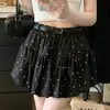 Fotos reais, preços reais. Saia-calça curta feminina assimétrica de cintura alta emagrecedora com laço estilo camisa primavera/verão