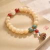 Raiz de Bodhi envelhecida pulseira de anel único amarelo-leite alta densidade material antigo pulseira de anel duplo pingente de Camélia Lótus contas de Buda Wenwan