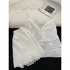 Pijama de diseño de nicho puramente deseable con cuello en V para mujer, nuevo conjunto de dos piezas para el hogar de color sólido para el verano, estilo chica picante, pantalones largos