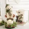 Decoraciones de mesa navideñas de espuma transfronterizas con hojas verdes, piñas, alces rústicos, figuras de muñeco de nieve y arreglos de escena