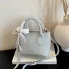 Bolso Cubo Amarillo Súper Trendy de Verano para Mujer 2026 Nuevo Bolso de Lujo para Mujer Coreano de Nicho Bolso de Hombro Cruzado para Teléfono