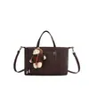 Colección nueva Otoño 2026: bolso de mano casual versátil con un look sofisticado, diseño simple, perfecto para ir al trabajo, y un bolso de hombro de moda, de nicho para mujer