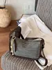 Bolsa de Tofu Trançada Fashion Tendência para Mulheres Verão 2026 Novo Estilo Ins Simples Casual Bolsa Saco Bolsa de Ombro para o Dia a Dia
