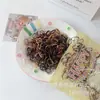 Gomas de Pelo de Goma Gruesas de Colores Coreanas Empacadas al por Mayor Alta Elasticidad No Daña el Cabello Bebé Desechables para Niños y Niñas