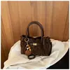 Shuai Mijia 2026 Otoño Nuevo Bolso de Mano de Gran Capacidad Vintage Nicho para Viajar Bolso Cubo de Hombro Único para Mujer