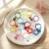 Llavero Anillo con Abalorio Estrella Acrílico Transparente de Colores Lindo Timbre Colgante DIY para Mochila