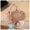 Bolsa de Bolos Portátil Retro para Mujer 2026 Nueva Moda Tendencia Bolso Cuadrado Pequeño Versátil Bolso de Hombro Cruzado