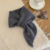 Bufanda de cuello cruzado de lana 100% pura de alta gama coreana para mujer, versátil para otoño e invierno, calentador de cuello y bufanda elegante fabricante