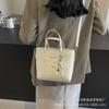Grande capacidade elegante moda mão-transporte texturizado bolsa feminina 2023 novo nicho francês simples ombro cor sólida bolsa crossbody