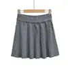 Falda Corta Sexy de Cintura Elástica Estilo Preppy Americano Falda Casual con Nudo Moda Versátil Falda de Línea A que Alarga las Piernas