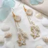 Pendientes de Goteo de Aceite Estilo Resort Oceánico de Lujo Ligero de Moda Verano Dulce Estrella de Mar Concha Pendiente Largo de Perlas con Borla Accesorios para Mujer