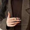 Estilo Igual de Blogger Colgante Metálico de Gota de Agua Collar con Cordón Negro Cadena Larga para Suéter Estilo Frío Simple para Mujer Accesorios de Alta Gama