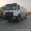 Suministro transfronterizo de camiones hormigoneras Howo usados, camiones hormigoneras Howo NX371 grandes de 10 metros cúbicos con tracción en las cuatro ruedas delanteras y tracción en las ocho ruedas traseras
