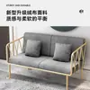 Sofá moderno minimalista de ferro dourado de luxo leve para lojas de roupas, poltrona de sofá individual famosa na internet, conjunto de sofá e mesa de centro para sala de estar